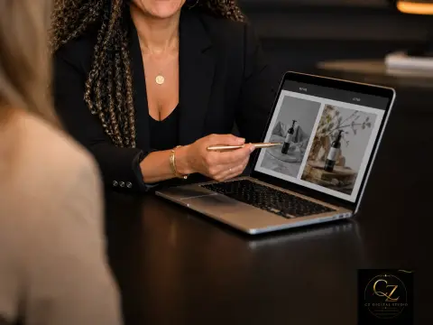 Caline presenting brand work on a laptop